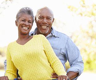 Men and women are cheering after devising a tailored retirement financial plan that aligns with their goals.